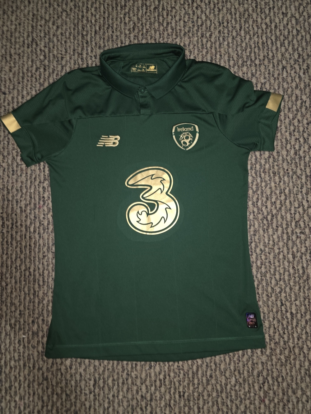 New Balance Kids Green Football Jersey with Gold Logos